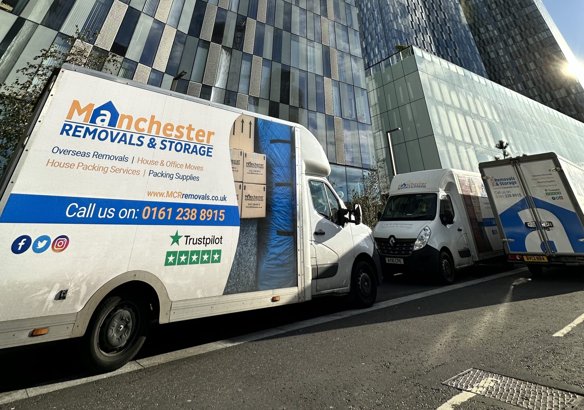 Removals Vans Parked Outside Deansgate Towers - Manchester Removals & Storage - Manchester Removals & Storage