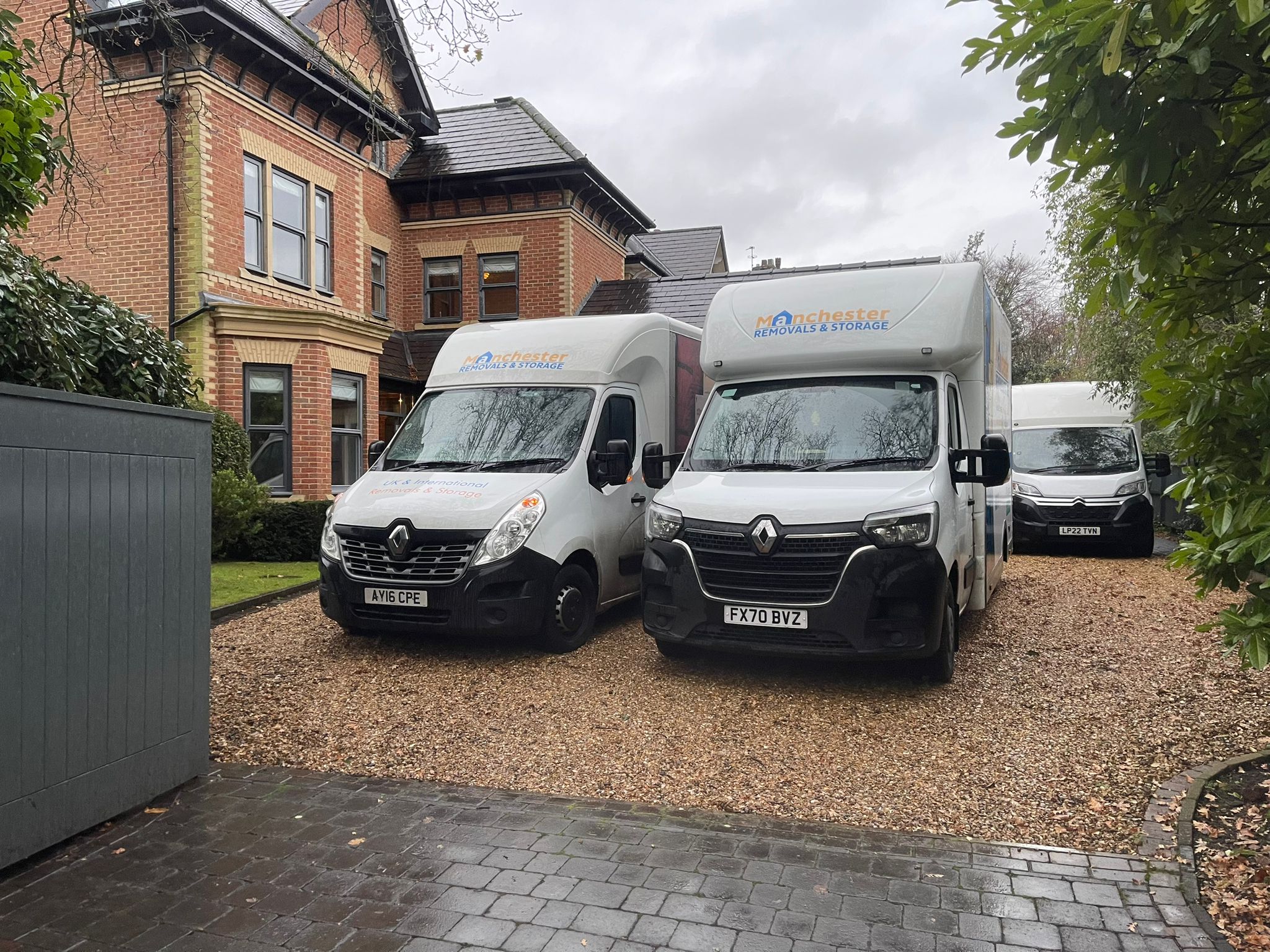 Manchester Removals and Storage Vans Outside Large Home - Manchester Removals & Storage - Manchester Removals & Storage
