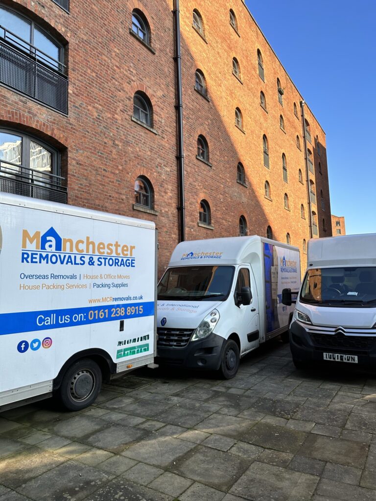 Vans Outside a Property in East Manchester - Manchester Removals & Storage